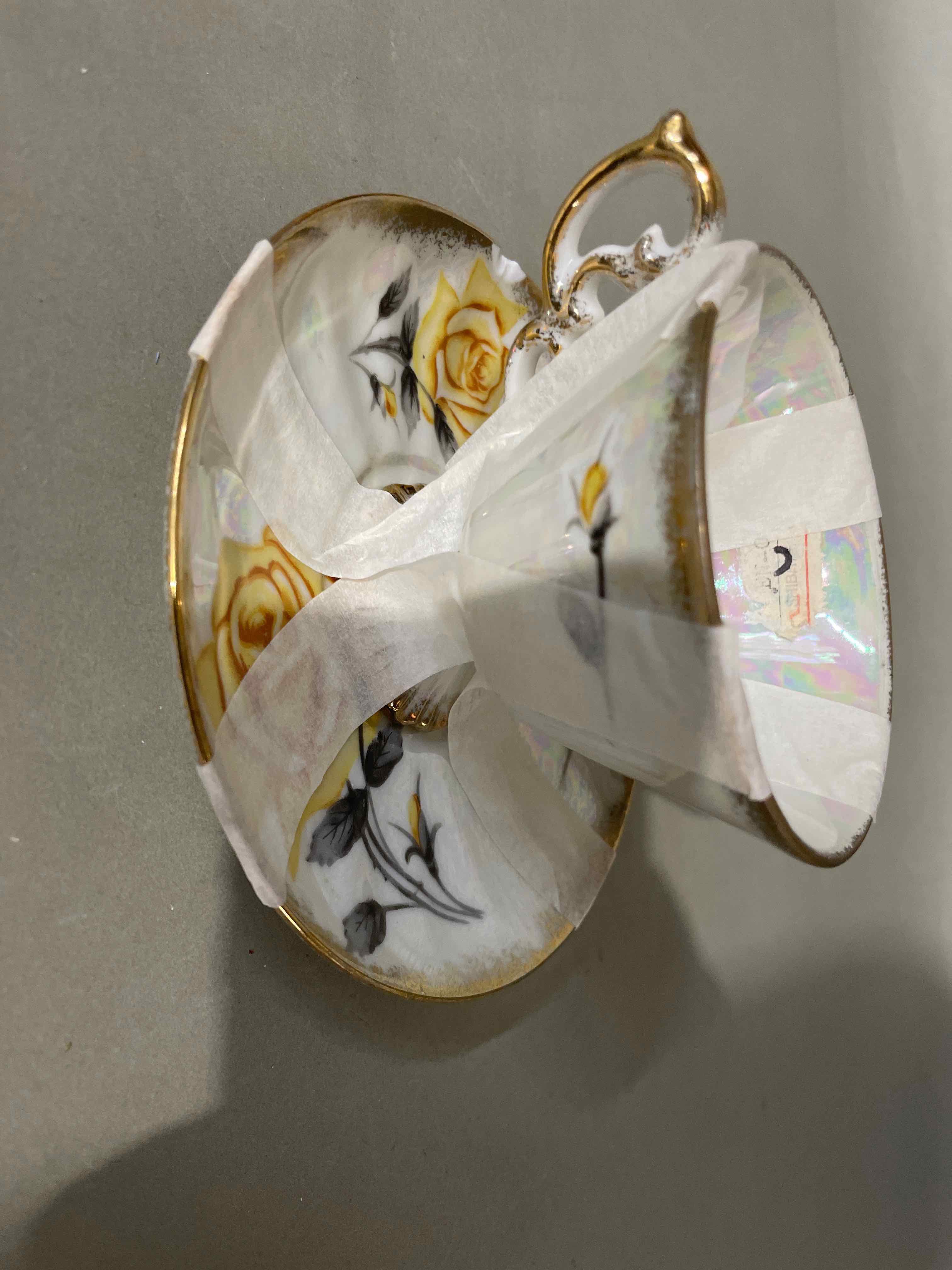 Porcelain White Floral Tea Cup and Saucer
