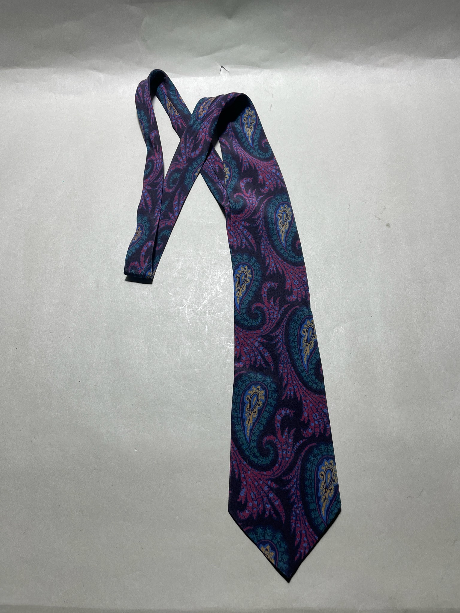 Colours black, green and pink paisley pattern silk tie