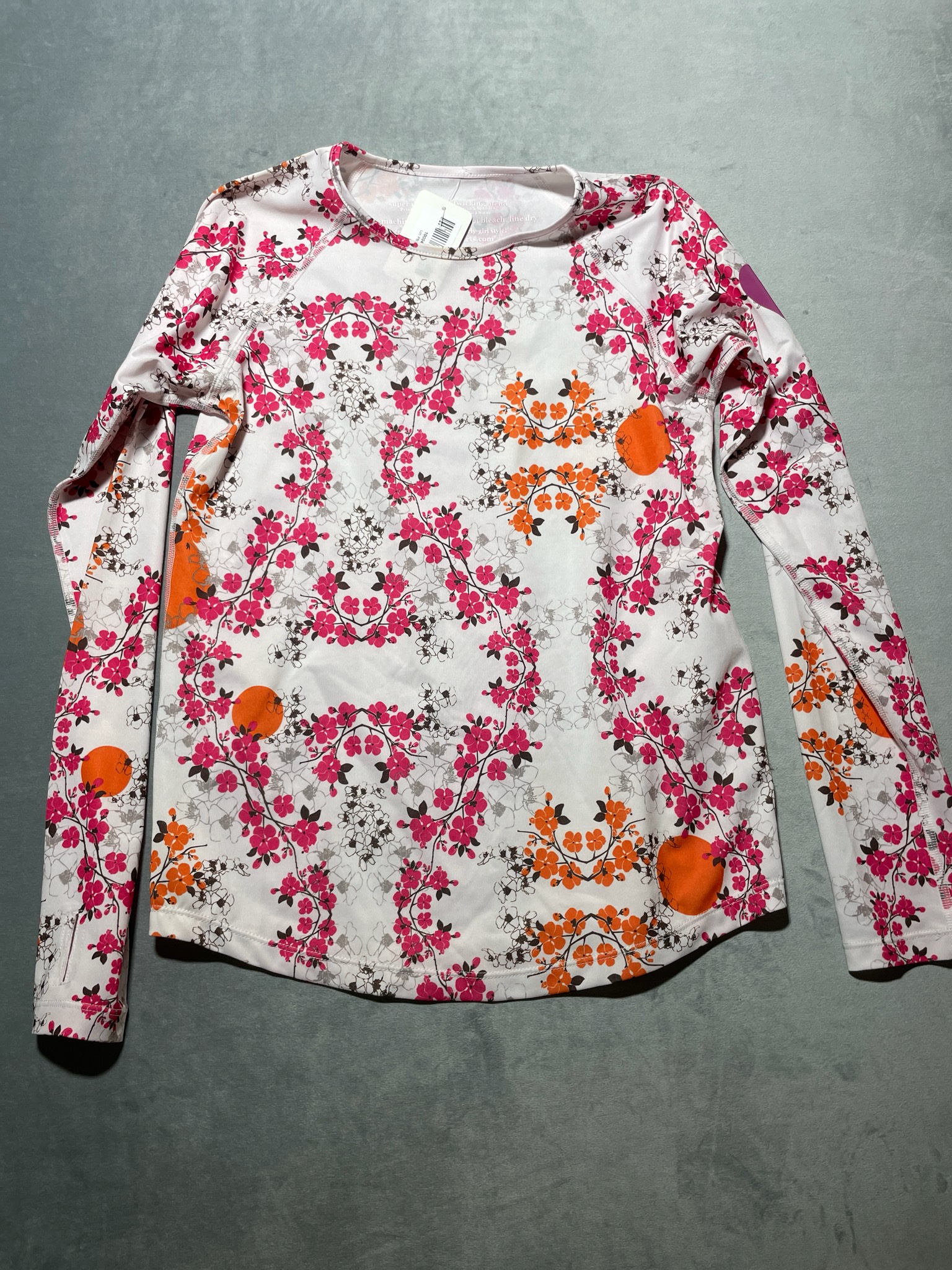 RunningSkirts White Floral Polyester-Spandex Long Sleeve Top
