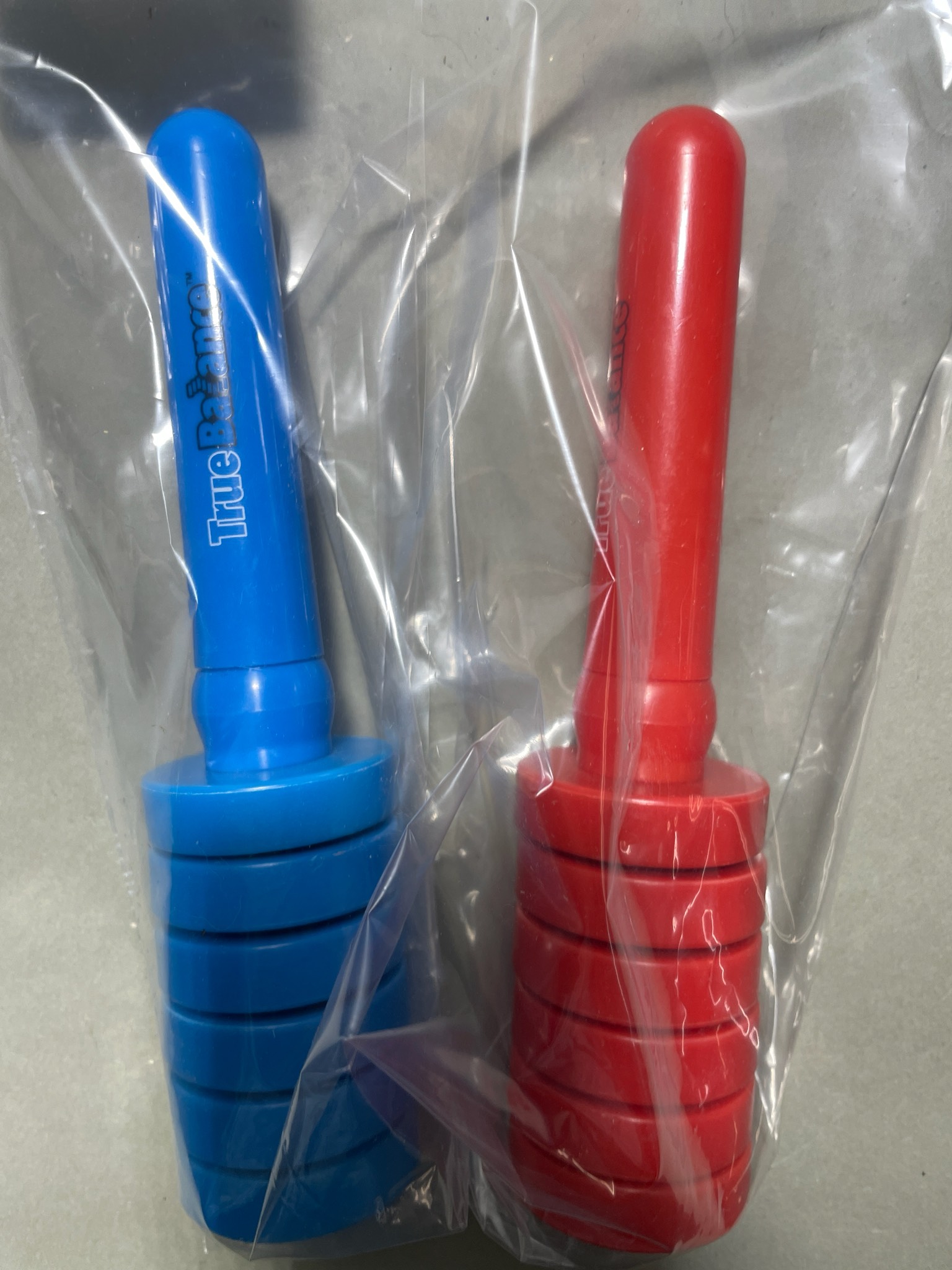 True Balance Blue and Red Molded Plastic Handheld Toy Set