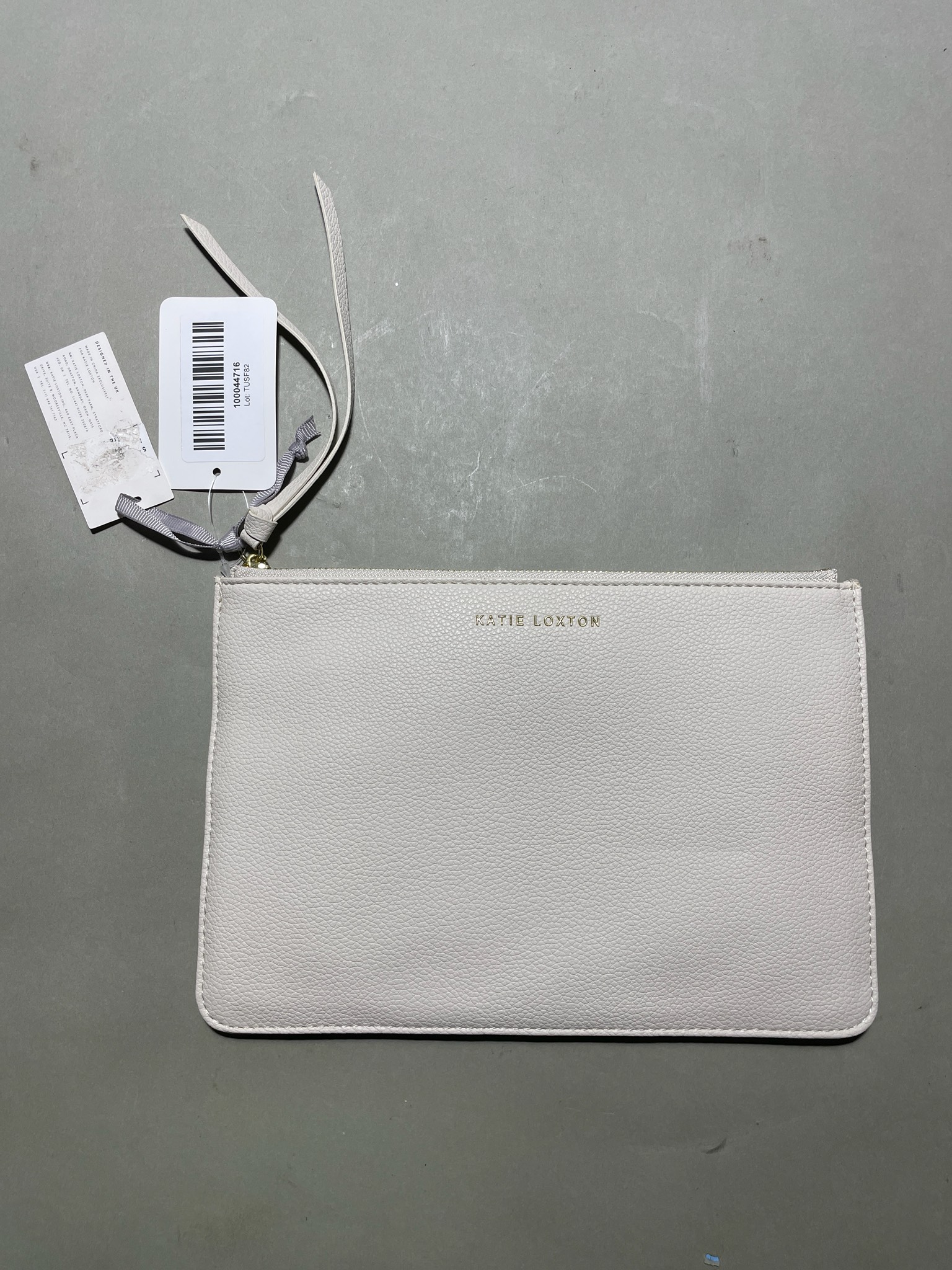 Katie Loxton Pale Pink Pebble-Texture Wristlet
