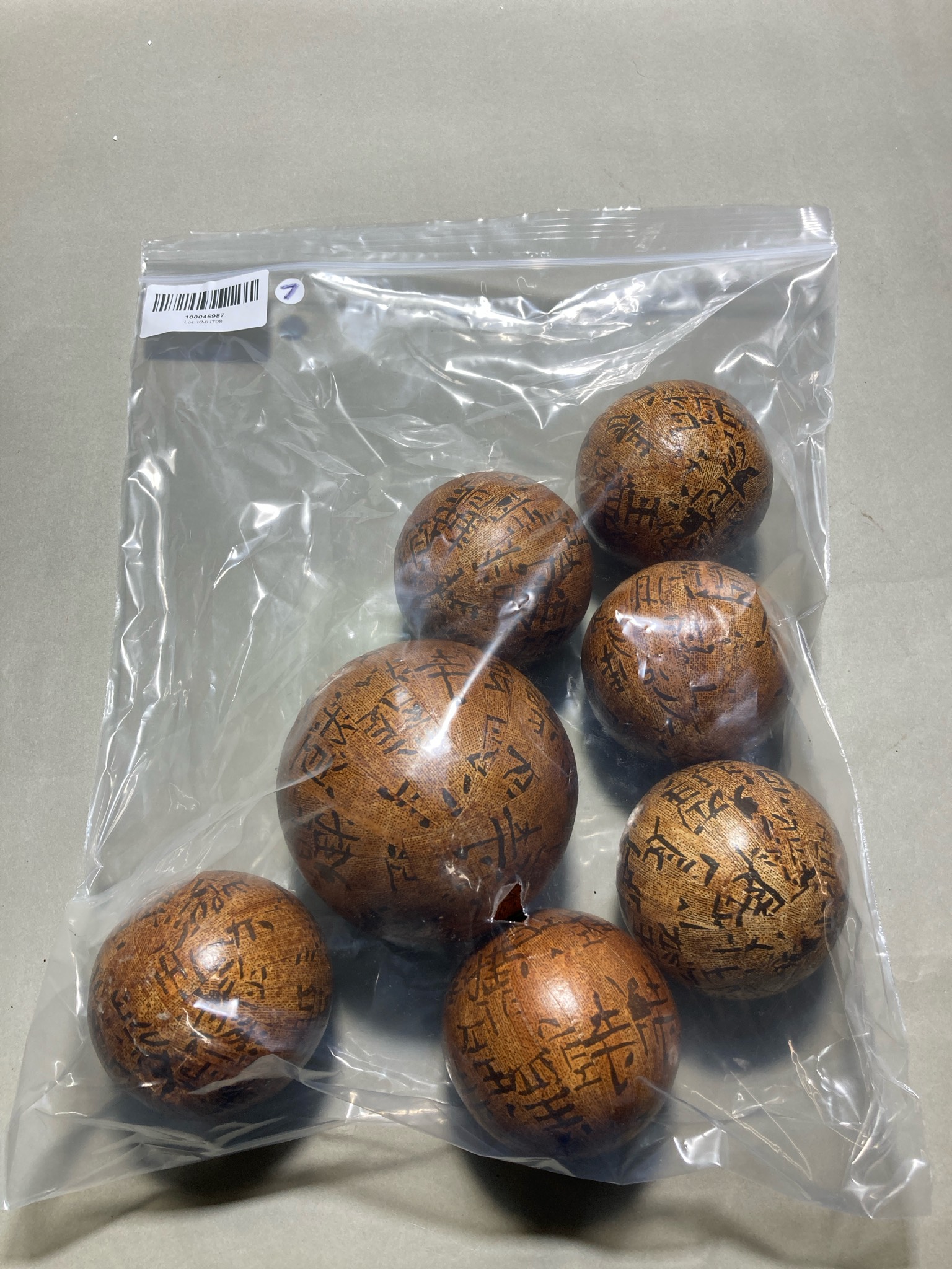 Brown Wooden Script-Printed Decorative Spheres