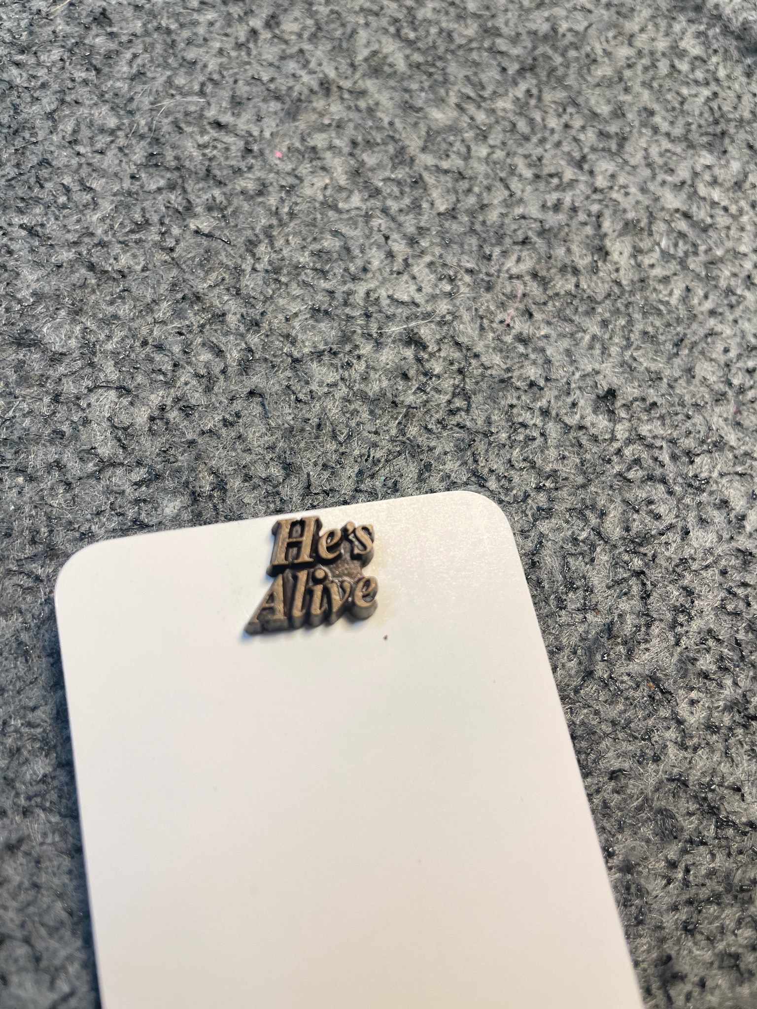 Bronze Raised Text Lapel Pin