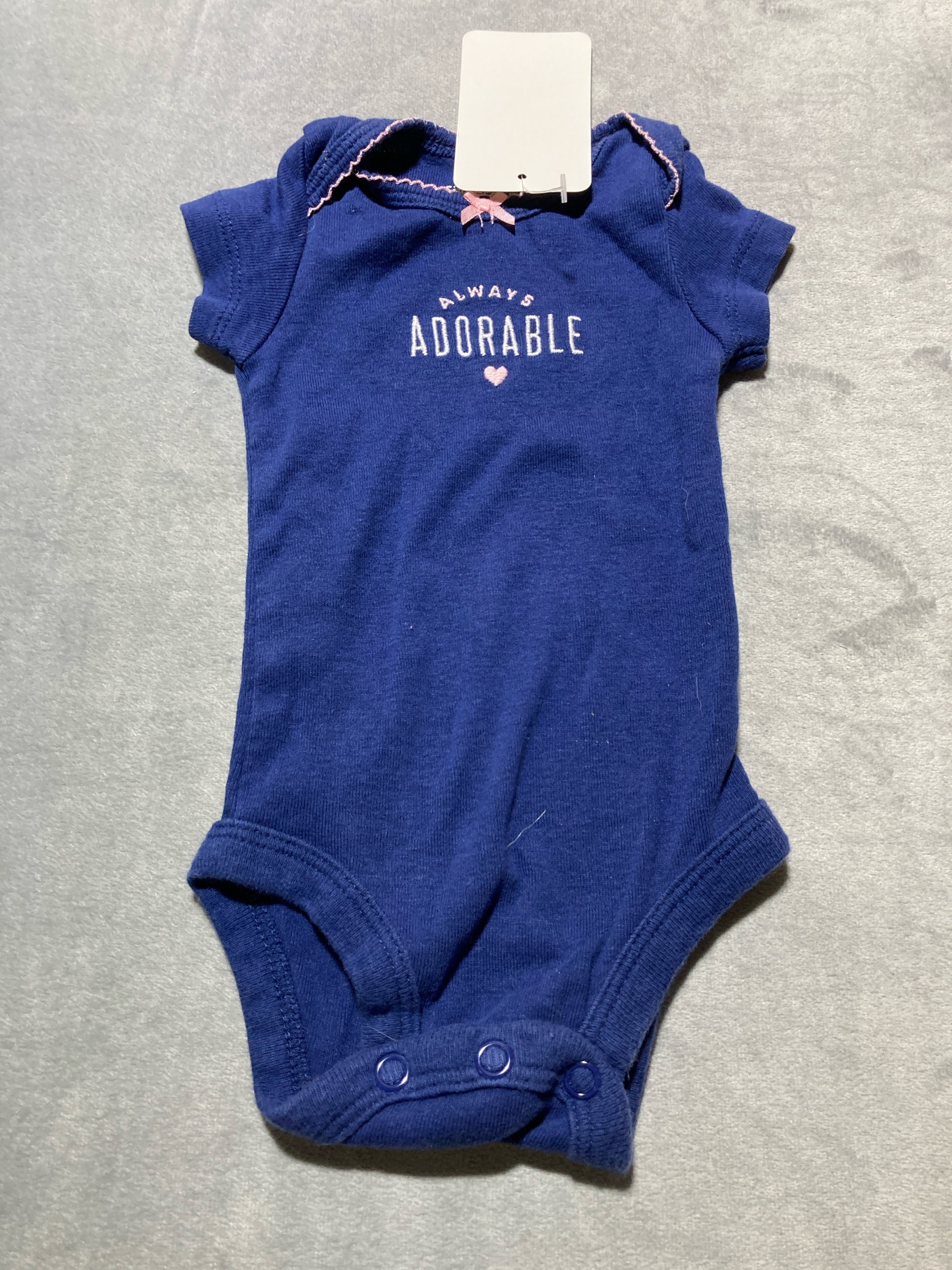 Carter's Navy newborn onesie