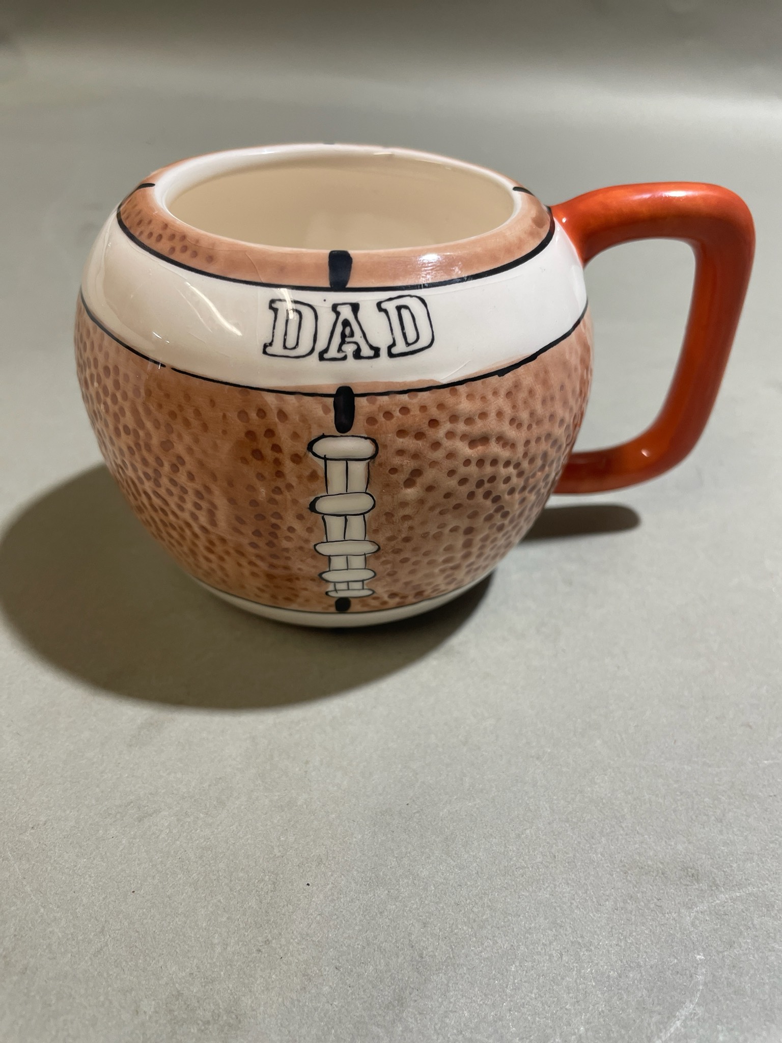 Brown Football-Shaped Ceramic Mug