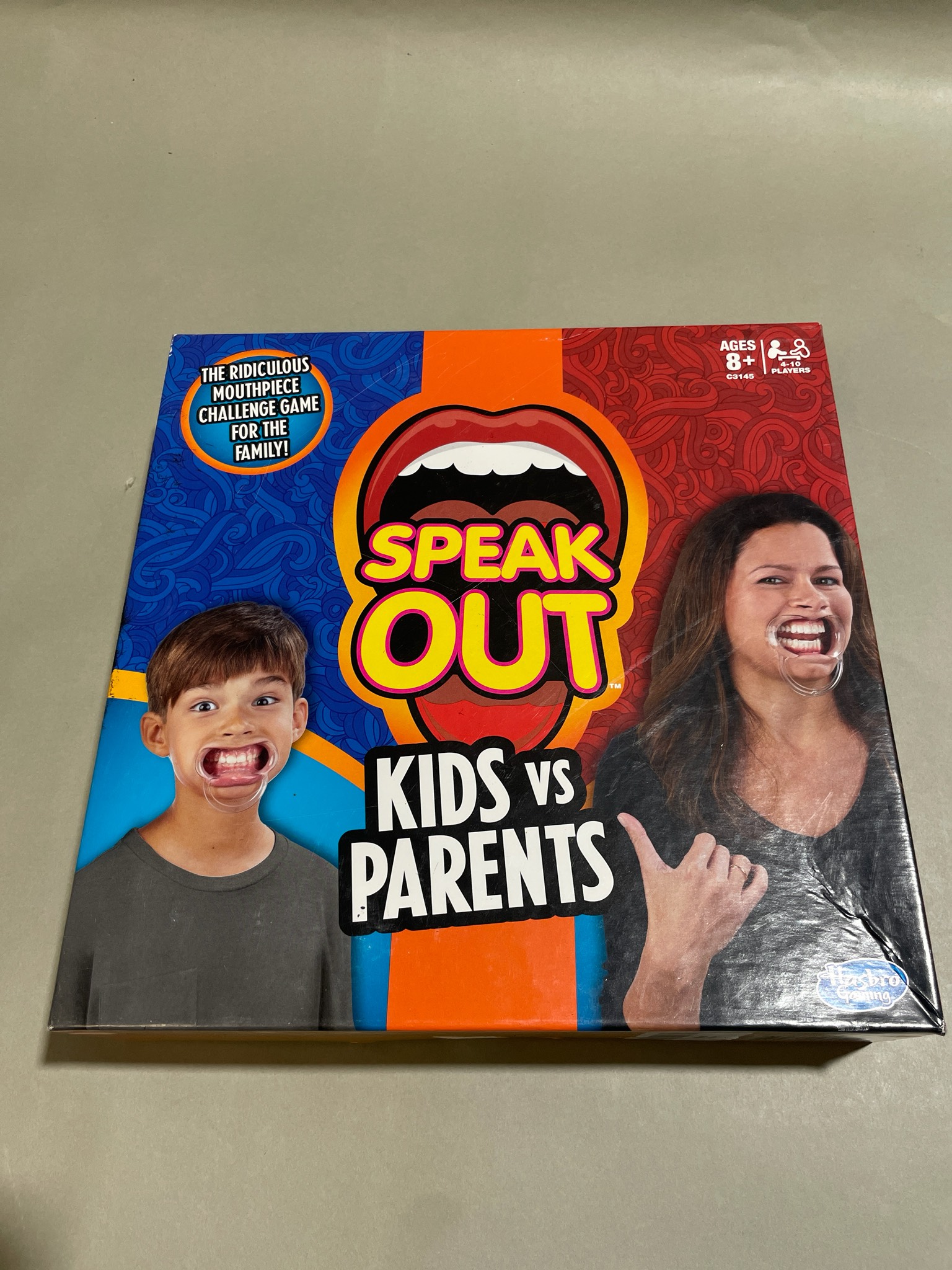 Hasbro Gaming Orange Speak Out Kids vs Parents Party Game