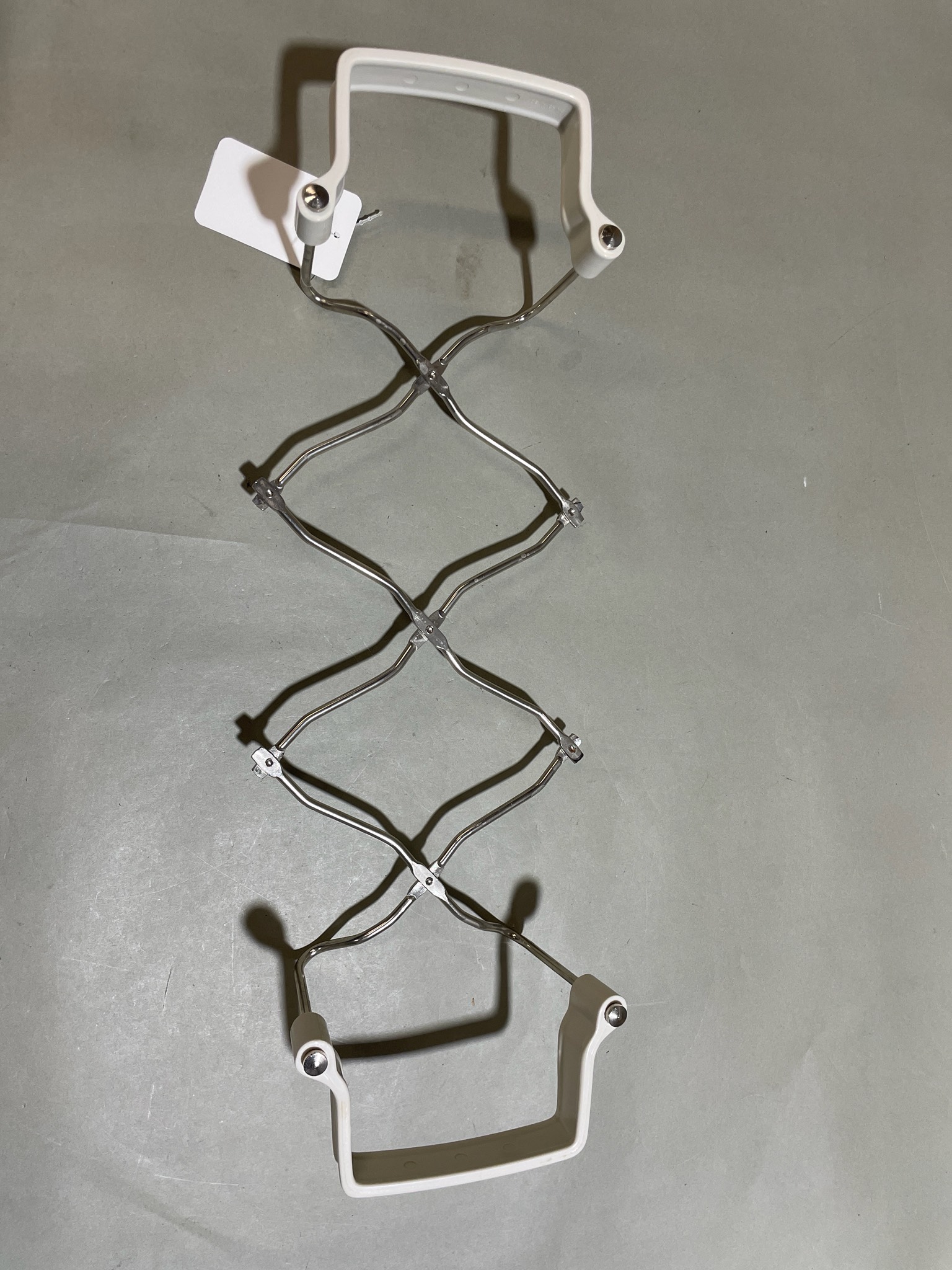 White and Silver Expandable Hanger