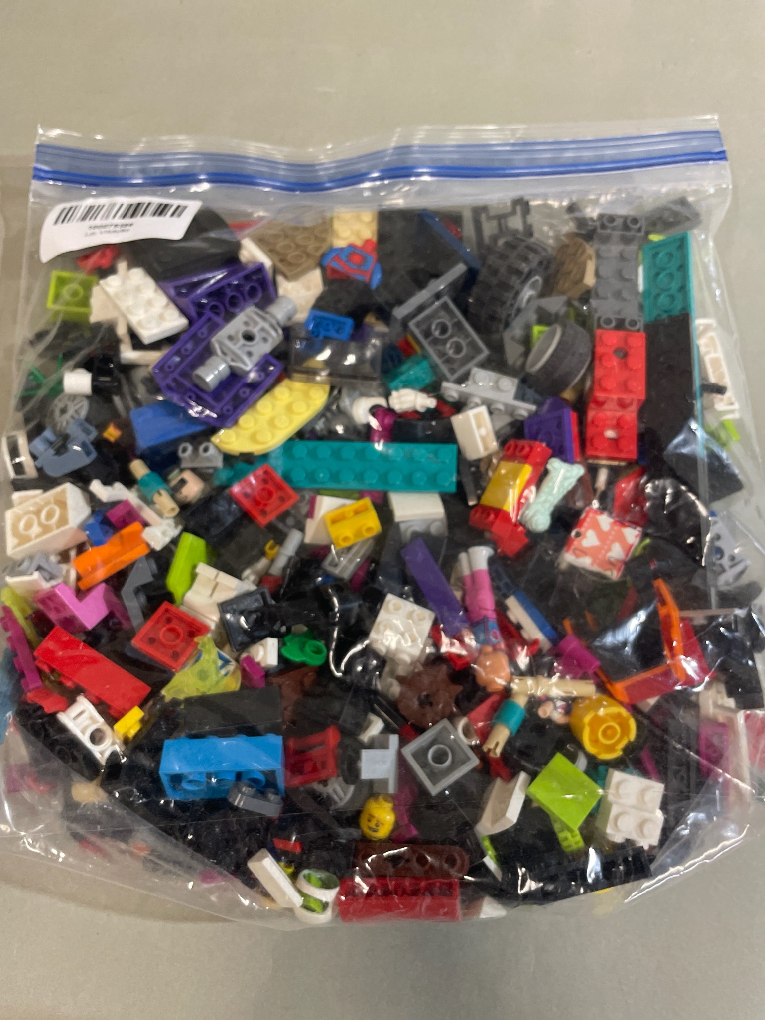 Multicolor Assorted Building Bricks and Minifigure Parts