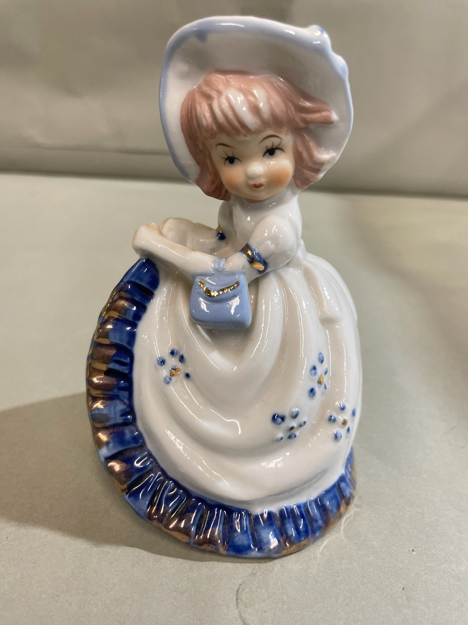 White and Blue Glazed Ceramic Bell Figurine
