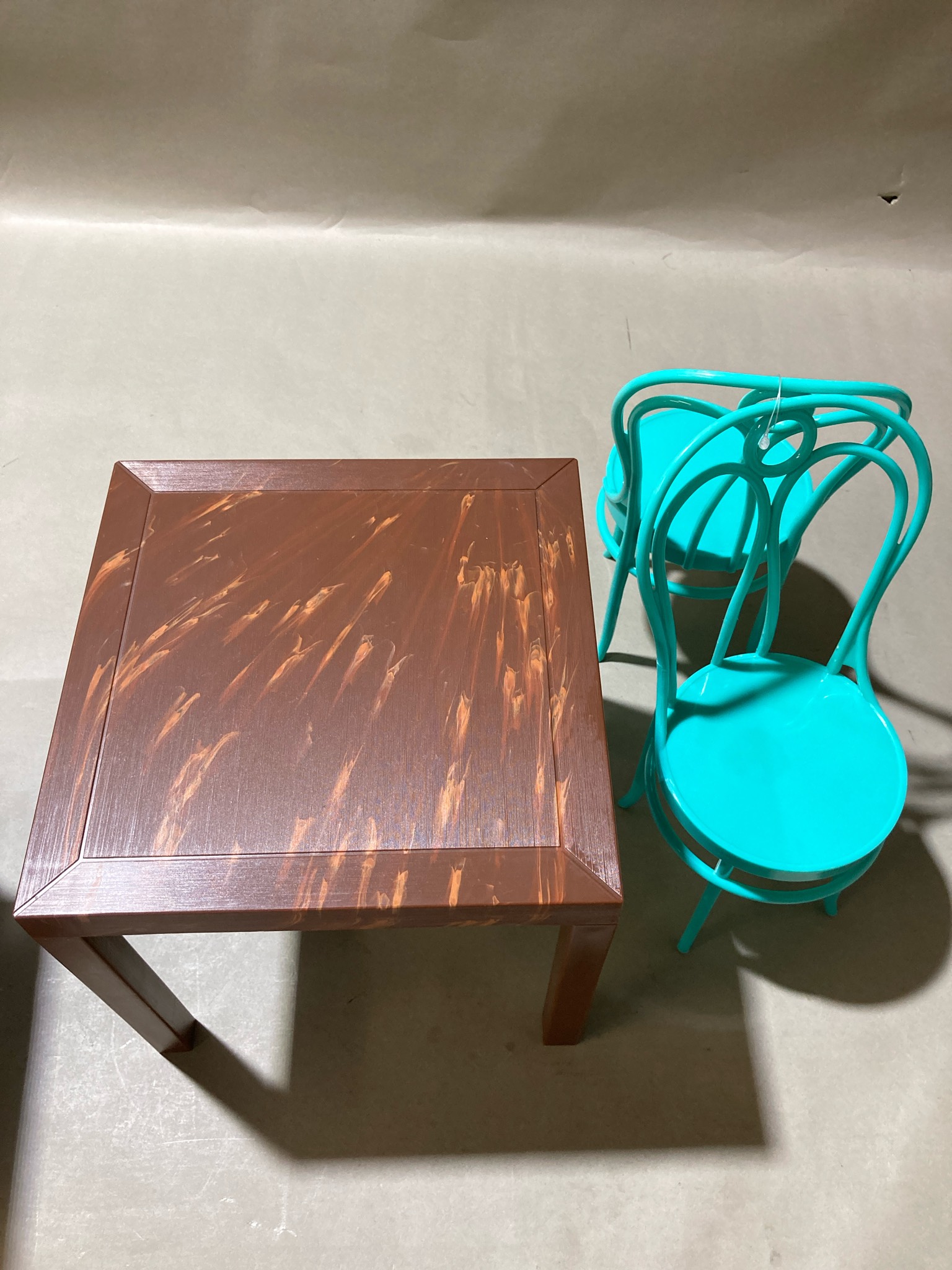 Brown Square Accent Table with Turquoise Bistro Chairs