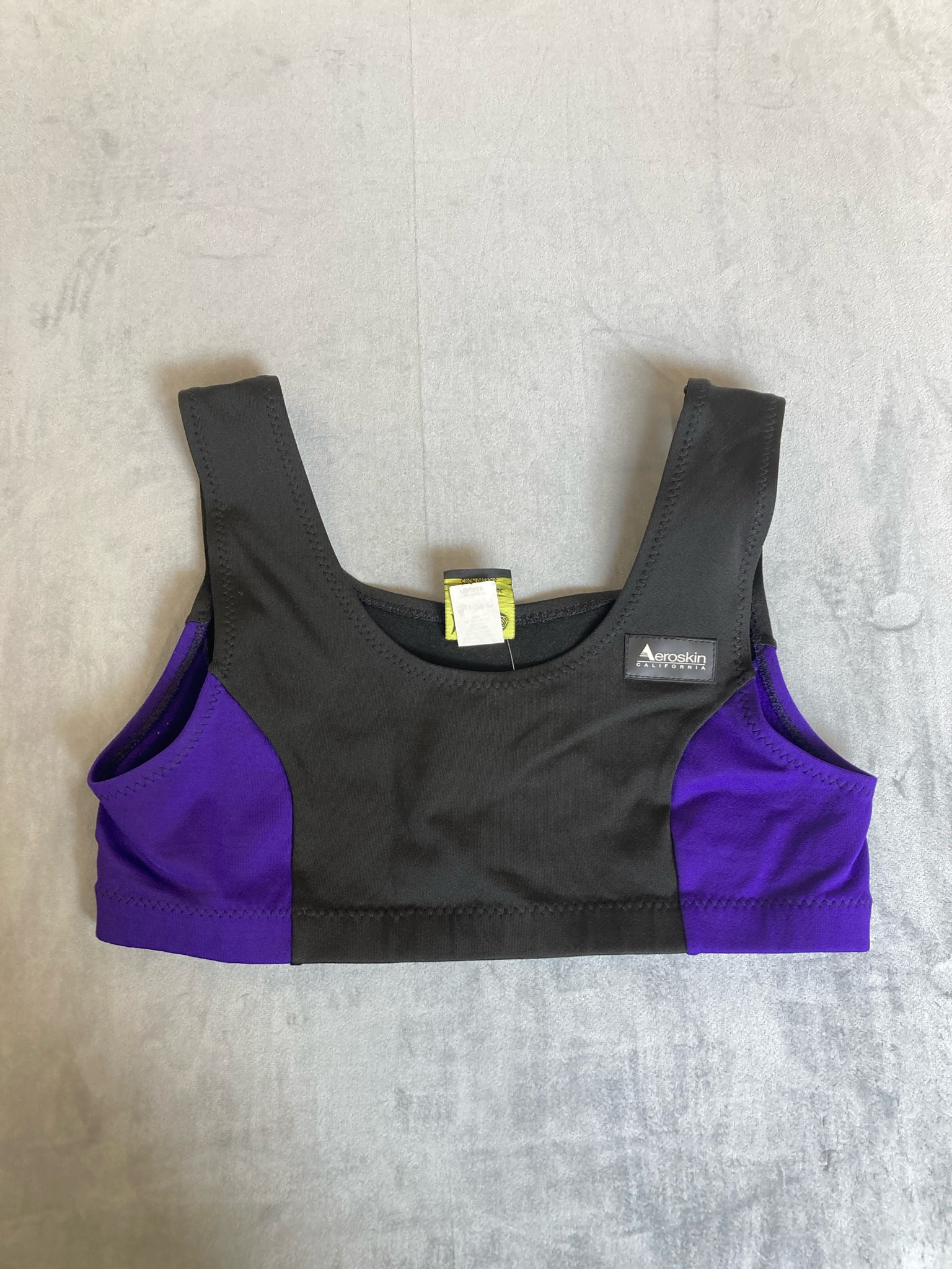 Aeroskin Black and Purple Colorblock Neoprene-Style Sports Bra