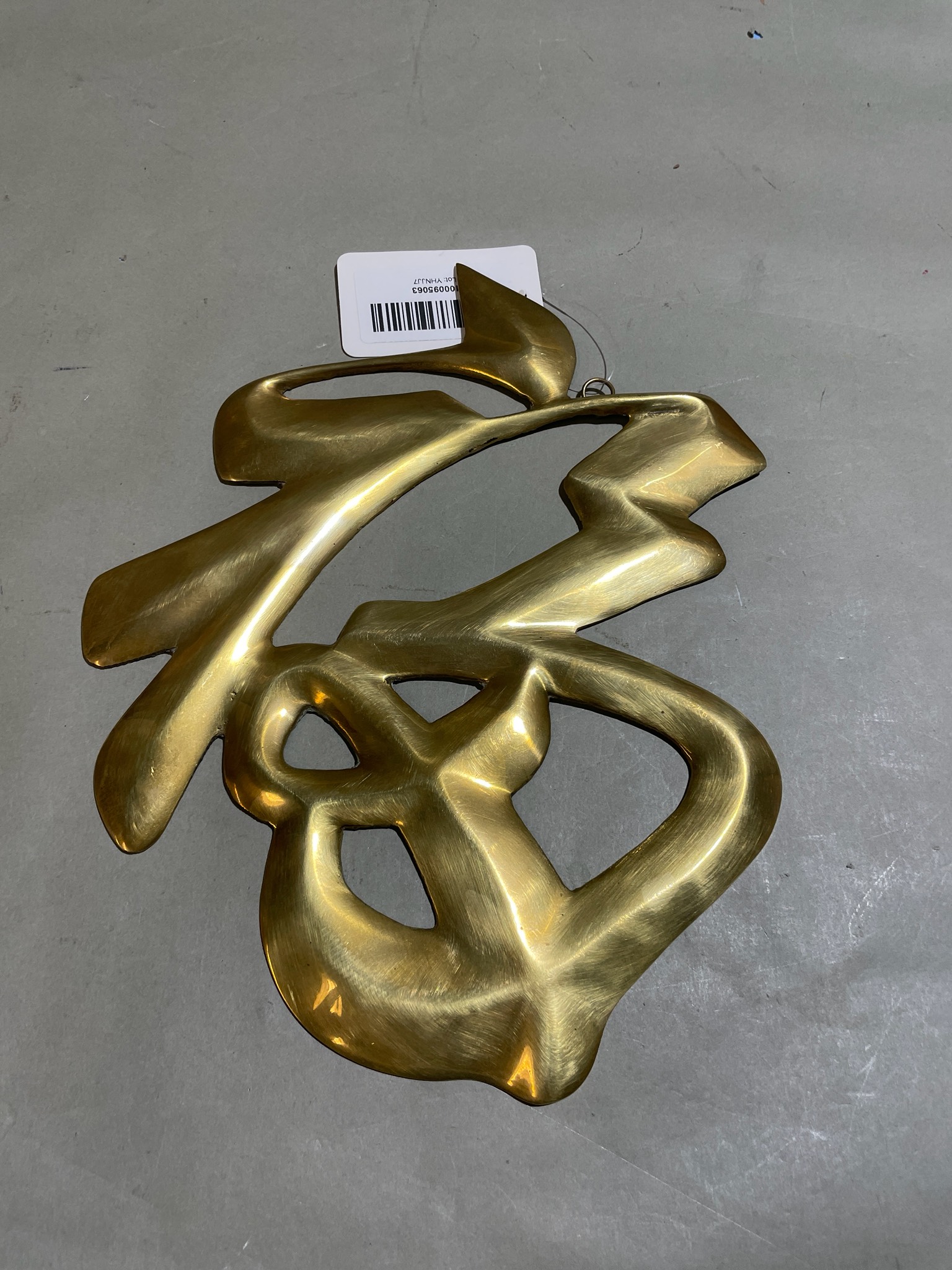 Gold Abstract Intertwined Metal Sculpture