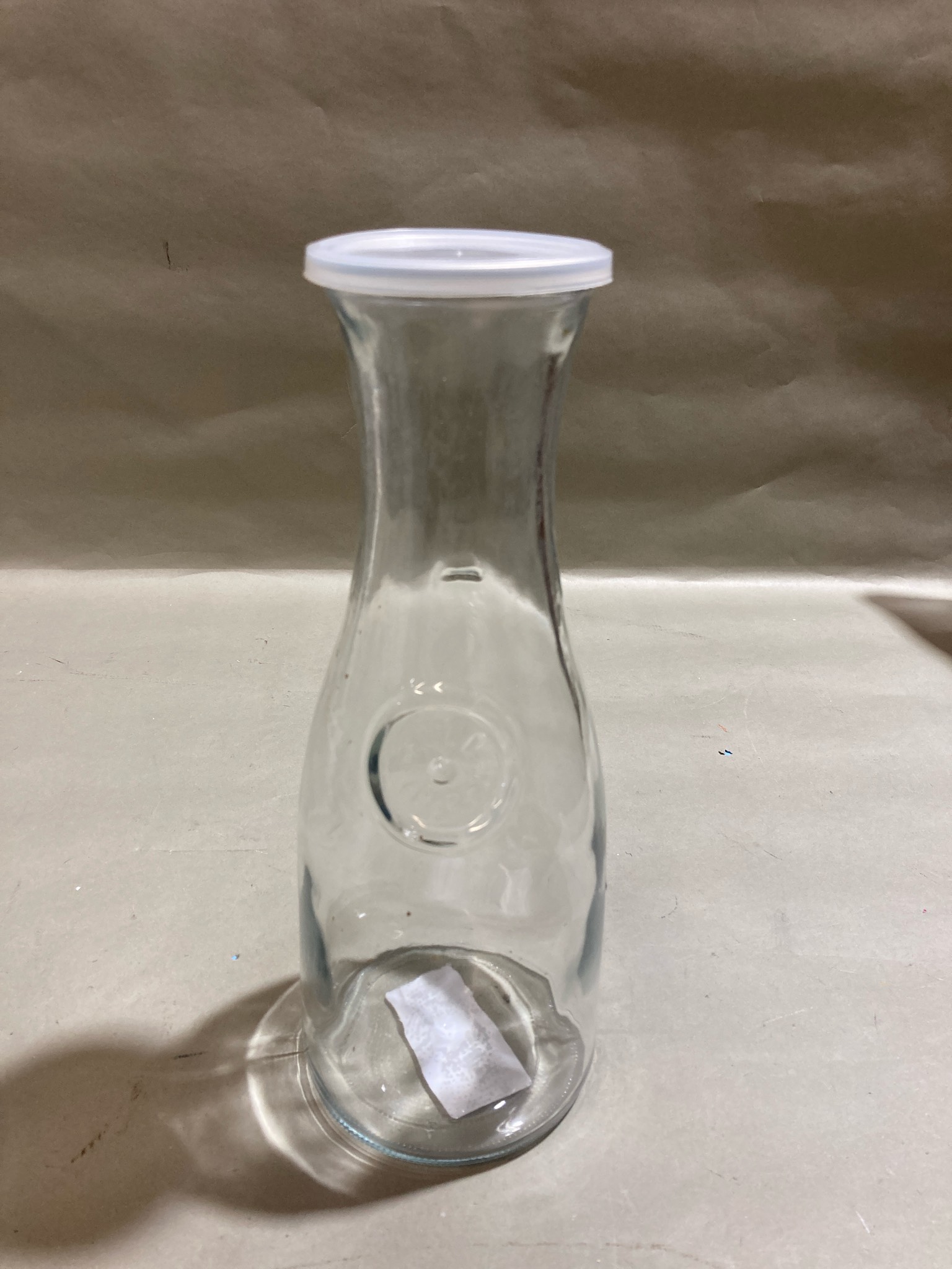 Clear Glass Bottle with White Lid