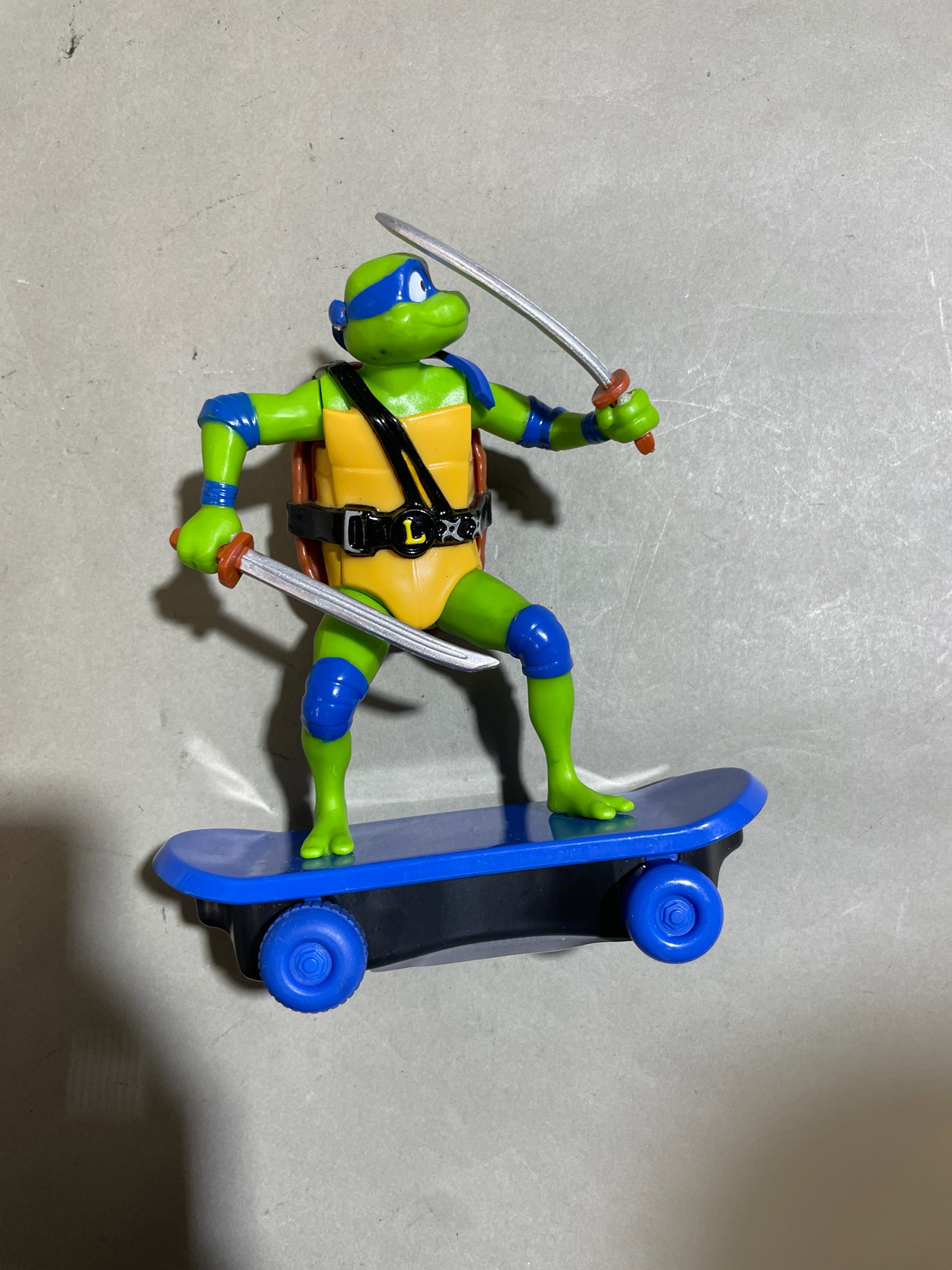 Green Turtle Action Figure With Skateboard