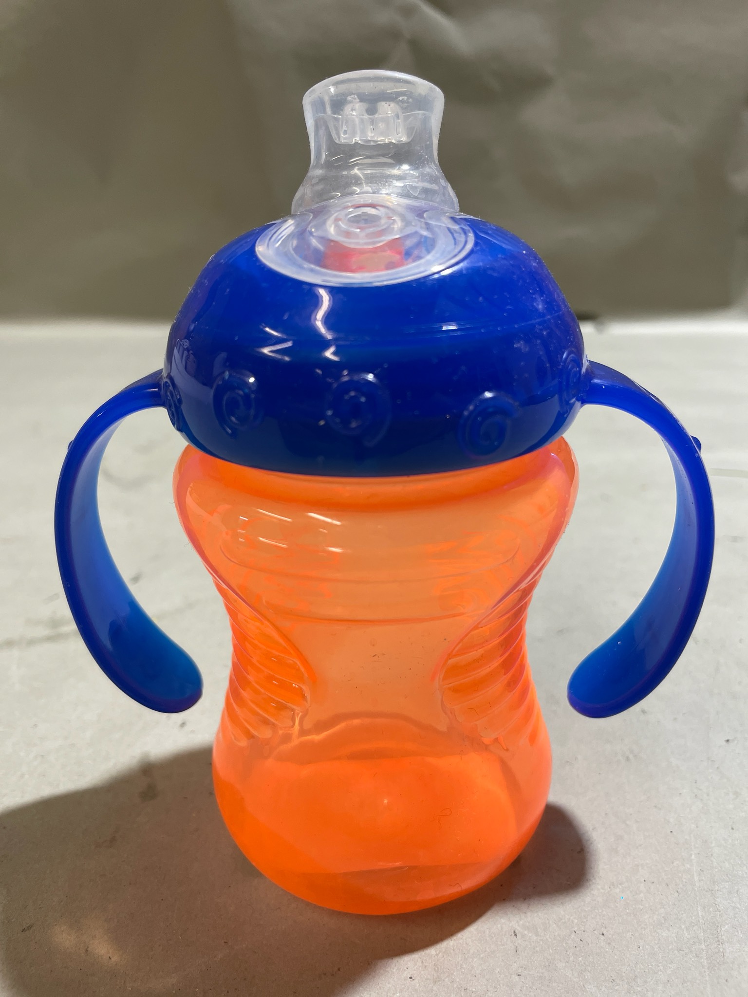 Orange and Blue Plastic Sippy Cup